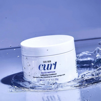 Color Wow Curl Wow Coco-Motion Lubricating Conditioner pot in water